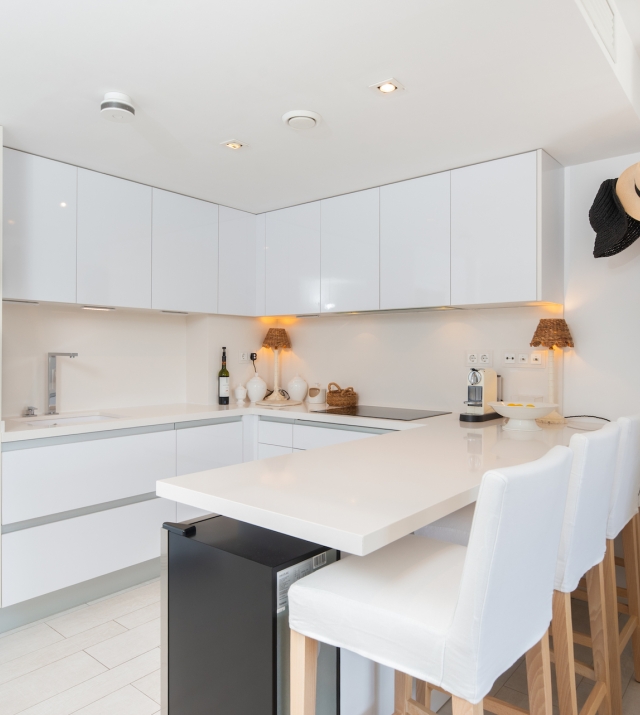 Resa Estates apartment for sale in Ibiza marina botafoch modern kitchen and bar.jpg